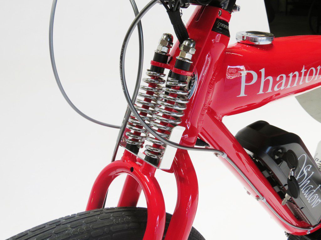 A close up of a red bike with the word phantom on it.