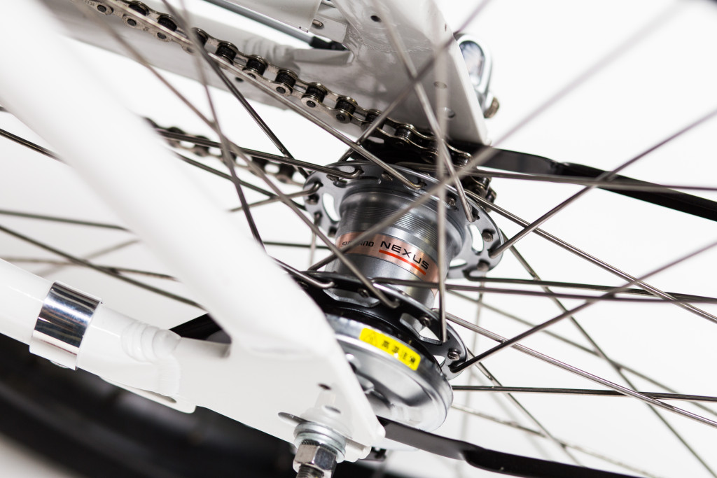 A close up of a bicycle's front wheel.