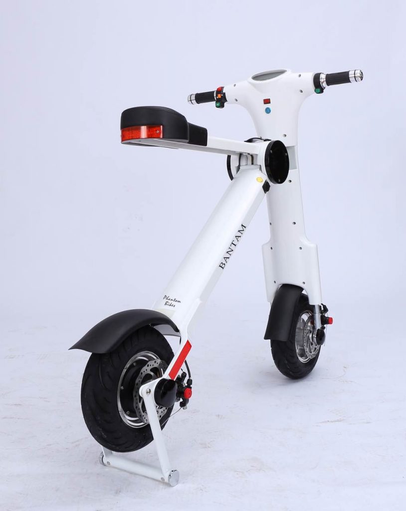 A white electric scooter on a white background.