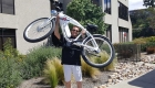 Phantom Bikes owner, John King, lifting the Phantom R bicycle